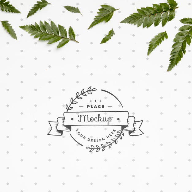 Flat Lay Of Frame Mock-Up With Leaves Psd