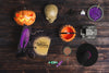 Flat Lay Of Halloween Elements On Wooden Background Psd