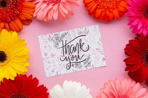 Flat Lay Of Letter And Colorful Flowers Psd