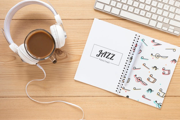 Flat Lay Of Music Concept Mock-Up On Wooden Table Psd