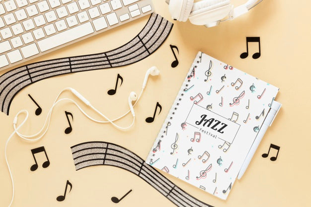 Flat Lay Of Music Concept On Plain Background Psd