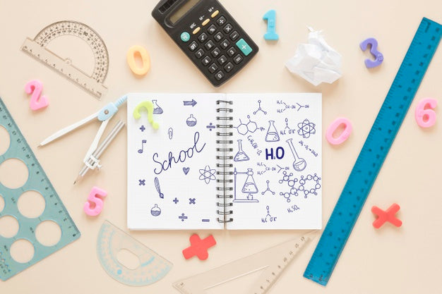 Flat Lay Of Notebook With Calculator And Rulers Psd