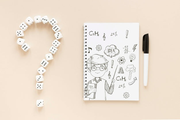 Flat Lay Of Notebook With Pen And Dice Psd
