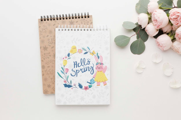 Flat Lay Of Notebooks With Spring Roses Psd