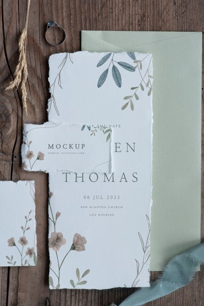 Flat Lay Of Paper Mock-Up Rustic Wedding Invitation With Leaves And Flowers Psd