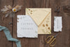 Flat Lay Of Paper Mock-Up Rustic Wedding Invitation With Leaves And Flowers Psd
