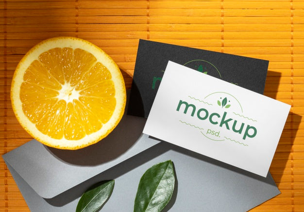 Flat Lay Of Paper Stationery With Citrus And Leaves Psd