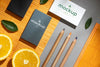 Flat Lay Of Paper Stationery With Citrus And Pencils Psd