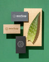 Flat Lay Of Paper Stationery With Leaf Psd