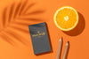 Flat Lay Of Paper Stationery With Pencils And Citrus Psd