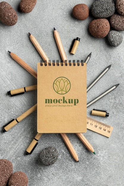 Flat Lay Of Paper Stationery With Stones Psd