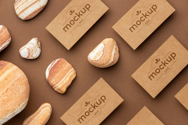 Flat Lay Of Paper Stationery With Stones Psd