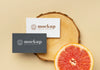 Flat Lay Of Paper Stationery With Wood And Citrus Psd