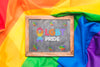 Flat Lay Of Rainbow Colored Fabric With Blackboard On Top Psd