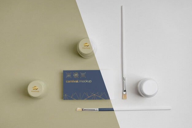 Flat Lay Of Simplistic Carnival Invitation With Paint Brushes Psd