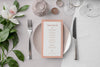 Flat Lay Of Spring Menu Mock-Up On Plate With Cutlery And Flowers Psd