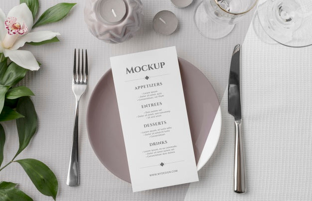 Flat Lay Of Spring Menu Mock-Up On Plate With Cutlery And Flowers Psd