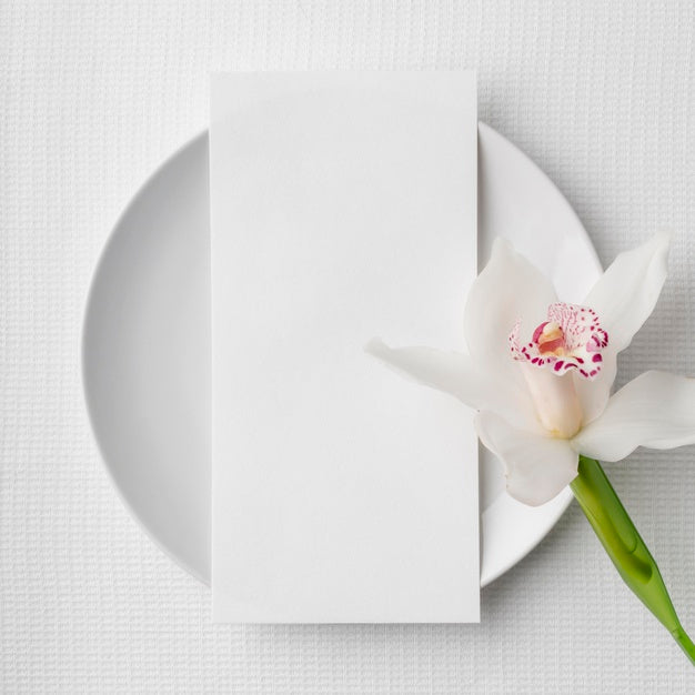 Flat Lay Of Spring Menu Mock-Up On Plate With Flower Psd