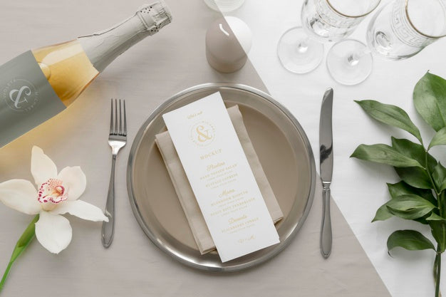 Flat Lay Of Spring Menu Mock-Up On Plates With Wine Bottle And Cutlery Psd