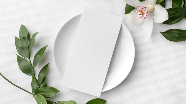 Flat Lay Of Spring Menu Mock-Up With Plate And Flower Psd