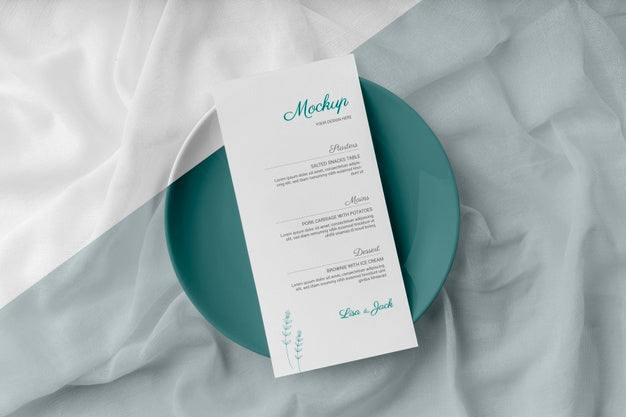 Flat Lay Of Table Arrangement With Spring Menu Mock-Up On Plate Psd