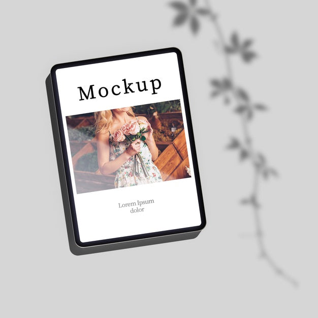 Flat Lay Of Tablet With Photo And Shadow Psd