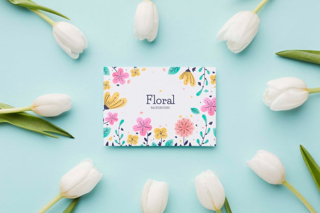 Flat Lay Of Tulips Frame With Card Psd