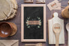 Flat Lay Of Wooden Dishes With Blackboard Psd