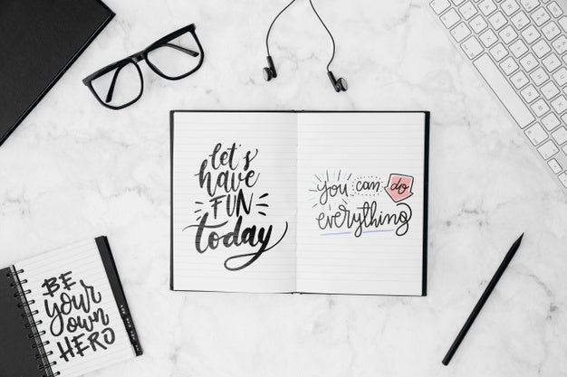 Flat Lay Open Book Mockup On Workspace Psd