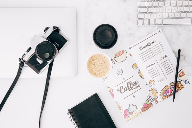 Flat Lay Open Brochure Mockup On Workspace Psd