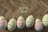 Flat Lay Painted Eggs On Table Psd