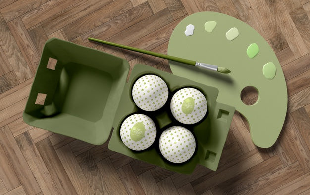 Flat Lay Painting Tools With Eggs On Table Psd