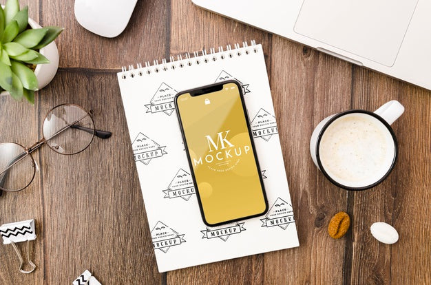 Flat Lay Smartphone And Notepad Mock-Up Psd