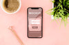 Flat Lay Smartphone Mock-Up With Coffee And Plant Psd