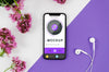Flat Lay Smartphone Mock-Up With Earphones And Flowers Psd