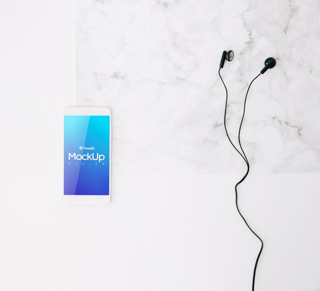 Flat Lay Smartphone Mockup On Workspace Psd