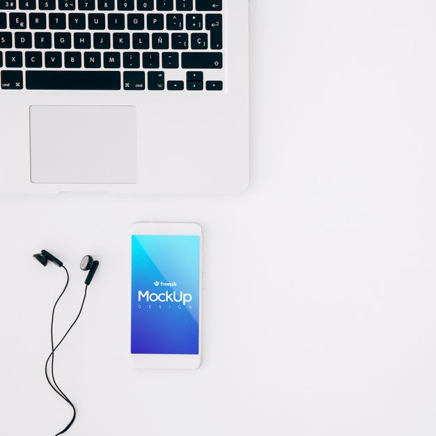 Flat Lay Smartphone Mockup On Workspace Psd