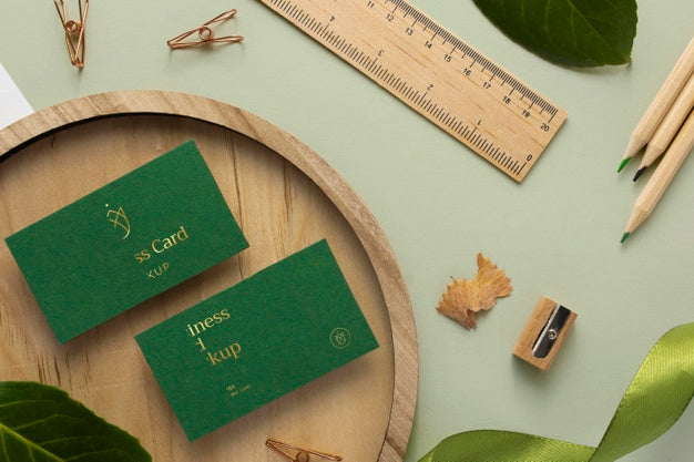 Flat Lay Stationery With Wood And Plant Psd