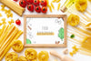 Flat Lay Uncooked Pasta Assortment And Tomatoes With Frame Mock-Up Psd
