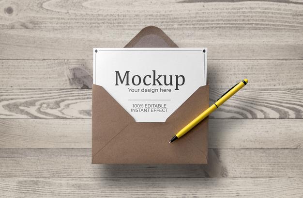 Floating Enveloped Card Over Wood Surface Mockup Psd