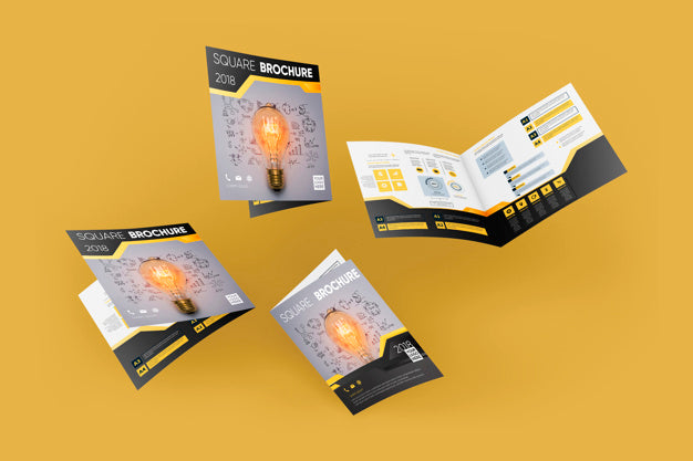 Floating Square Brochure Mockup Above Wooden Surface Psd