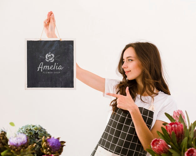 Florist Holding Mock-Up Sign Psd