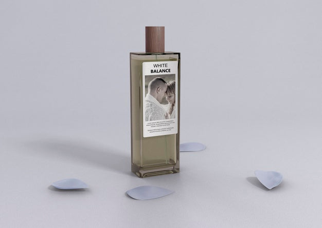 Flower Petals Beside Perfume Bottle Psd