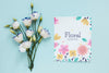 Flowers And Greeting Card On Table Psd