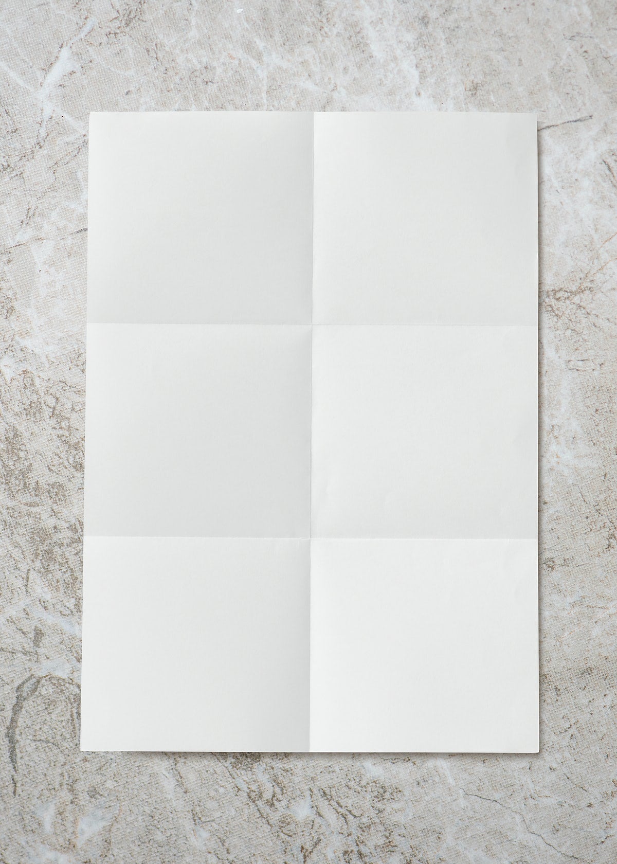 Folded Paper Crease On Marble Background
