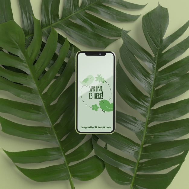 Foliage With Phone On Top Psd