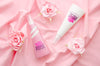 Fragrance Bottles On Pink Fabric Background Psd