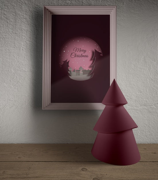 Frame Hooked On Wall With Miniature Christmas Tre Psd