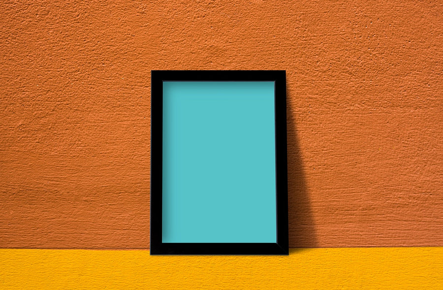 Frame Mockup Against An Orange Wall