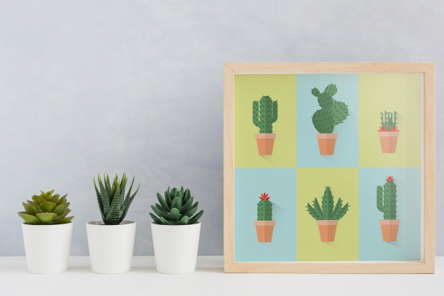 Frame Mockup Next To Plants Psd